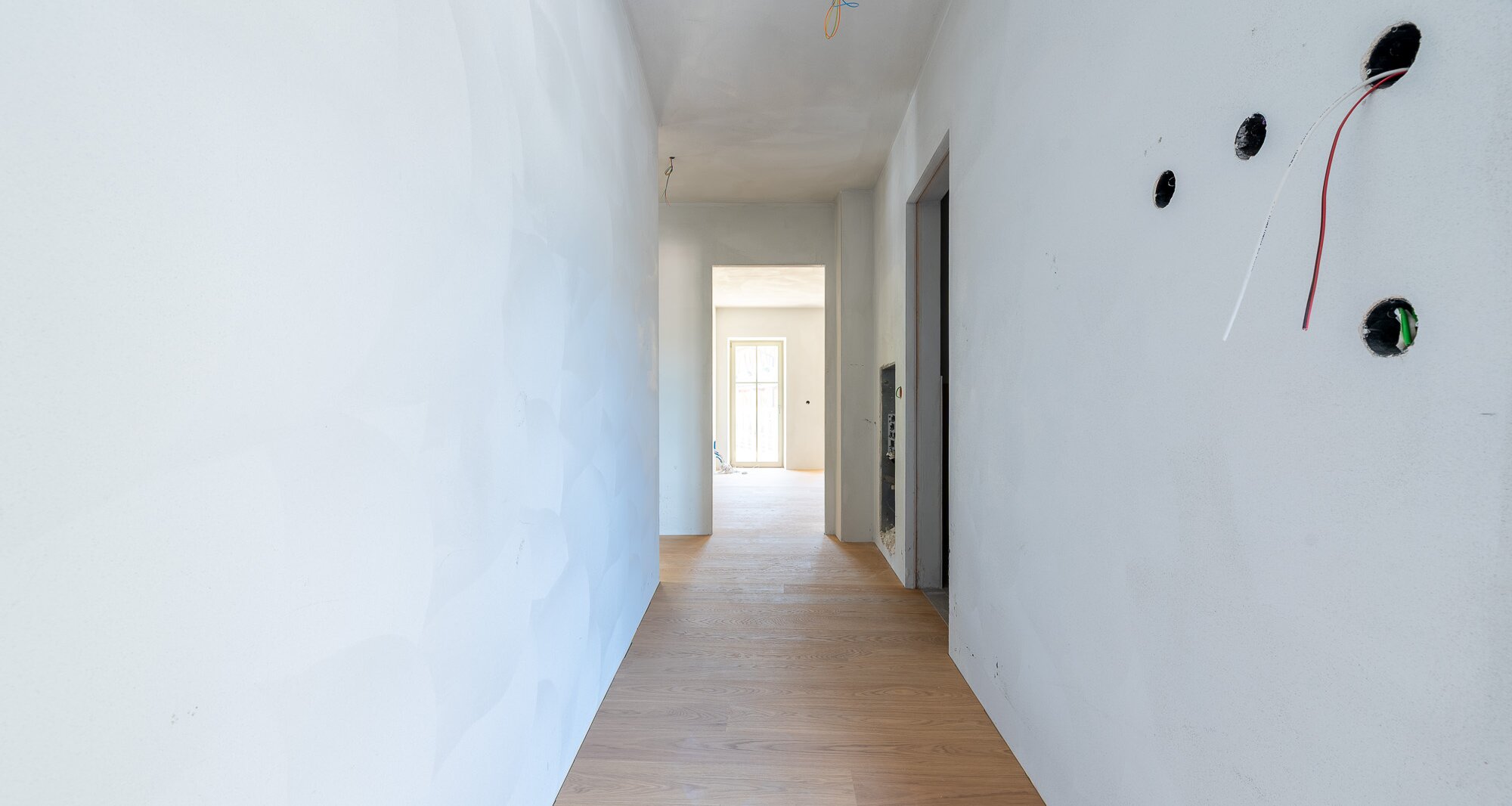 A3: Neue Vierzimmerwohnung im hohen Stockwerk mit ca. 400 m² Privatgarten