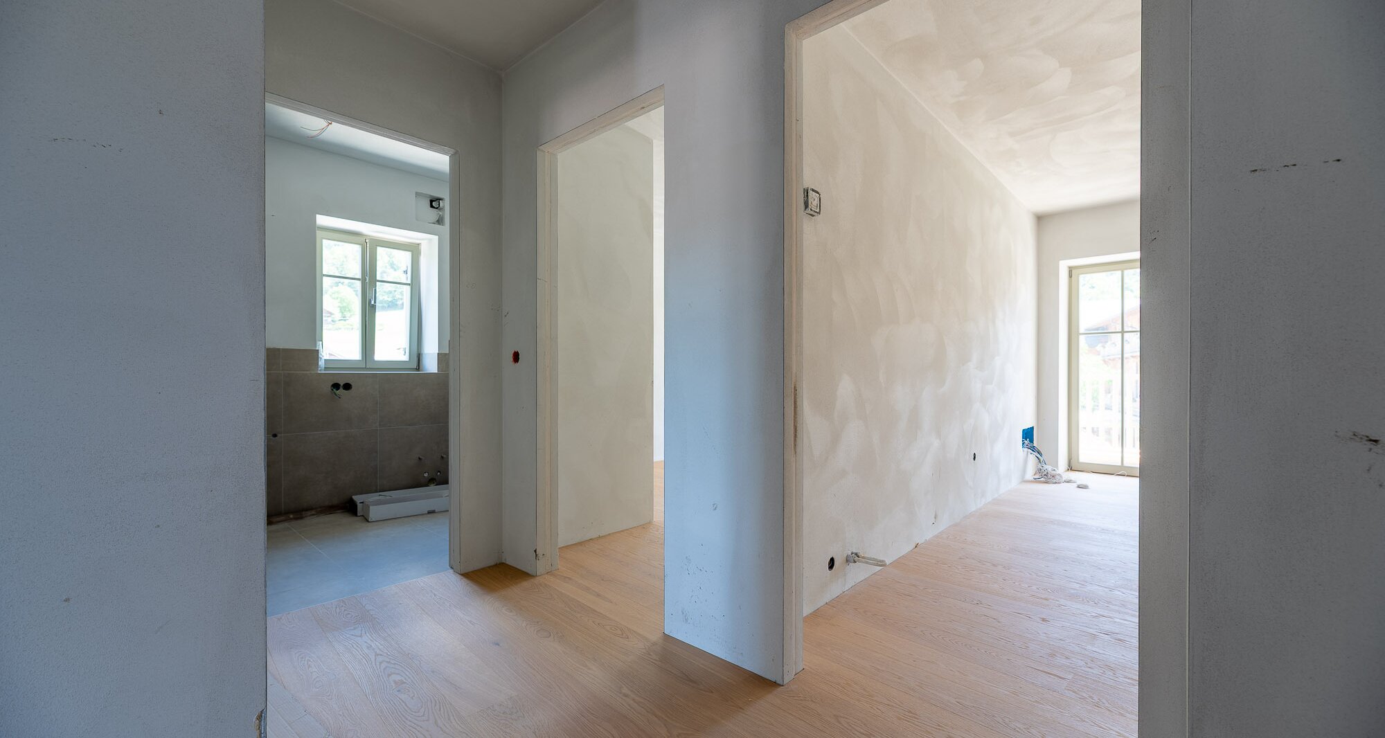 A3: Neue Vierzimmerwohnung im hohen Stockwerk mit ca. 400 m² Privatgarten