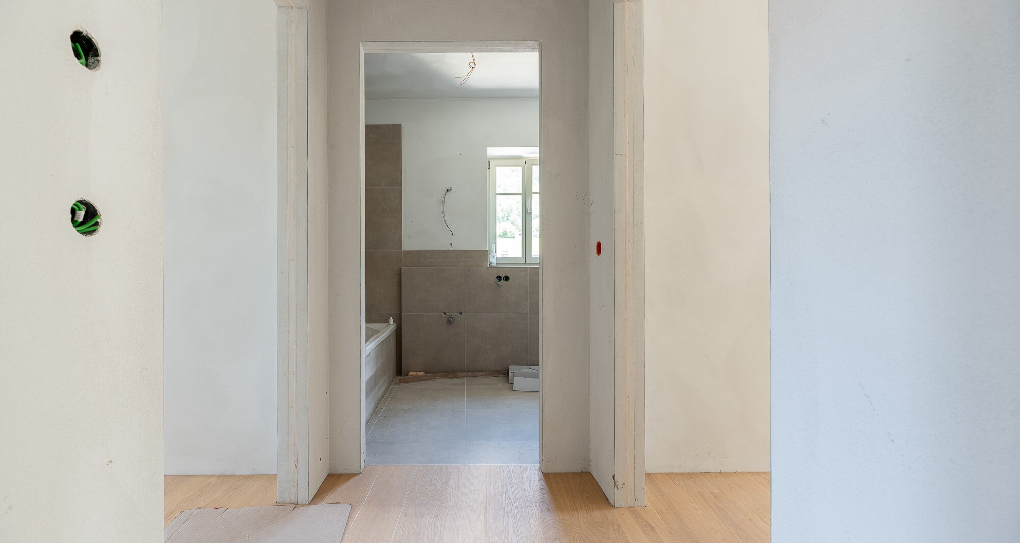 A3: Neue Vierzimmerwohnung im hohen Stockwerk mit ca. 400 m² Privatgarten