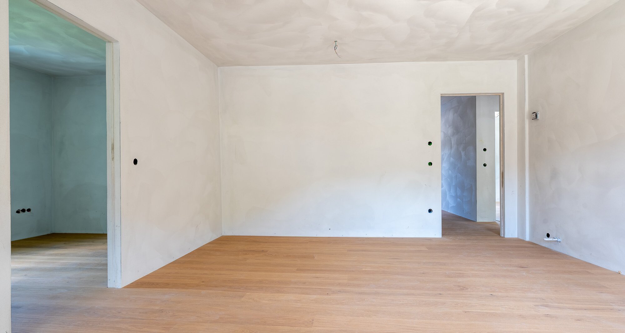 A3: Neue Vierzimmerwohnung im hohen Stockwerk mit ca. 400 m² Privatgarten