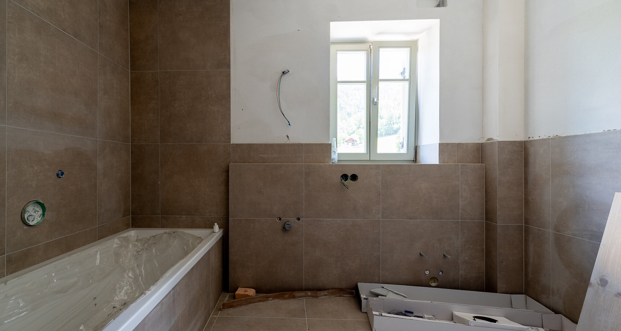 A3: Neue Vierzimmerwohnung im hohen Stockwerk mit ca. 400 m² Privatgarten